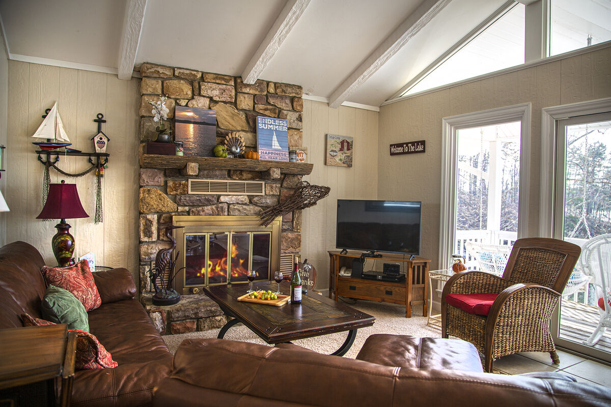 Enjoy the Fireplace while overlooking the Lake