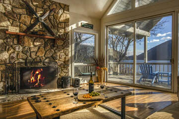 Enjoy the wood fireplace while overlooking the Lake and the Mountain