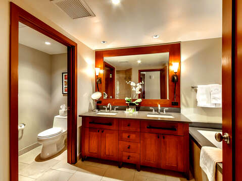 Master Bathroom with double vanity, shower, soaking tub