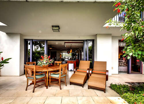 Loungers and Table on Lanai at vacation rental in Ko Olina Oahu Hawaii.