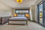 Master Bedroom with King Bed, Private Master Bathroom, 50 inch HD 4K Smart TV/Direct TV, Gas Fireplace, and Private Deck