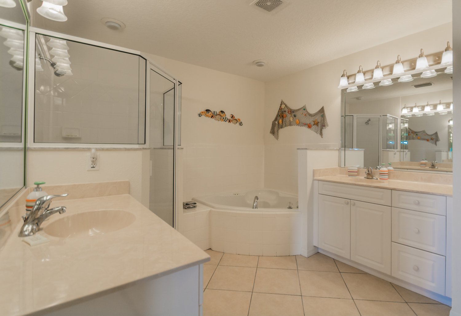 Master bath with walk in shower and Jacuzzi tub.