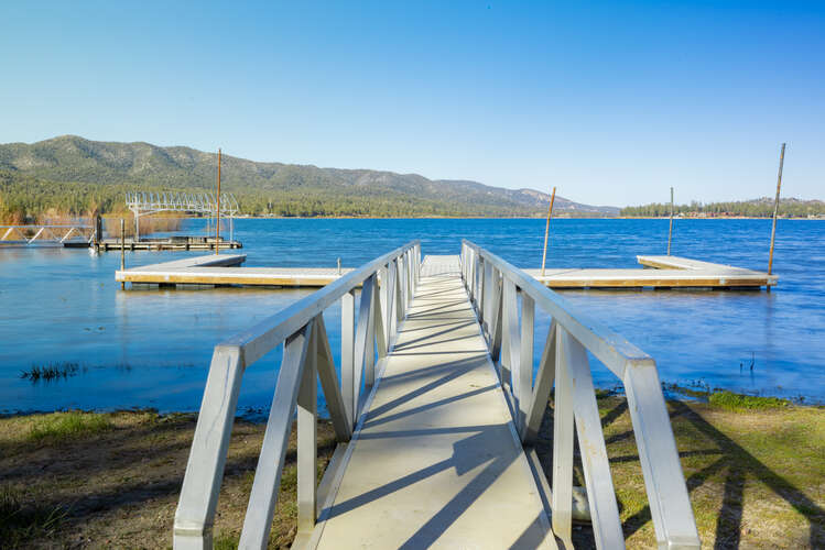 Feet from your cabin is the shore of Big Bear Lake with immediate lake access and a summertime boat dock.