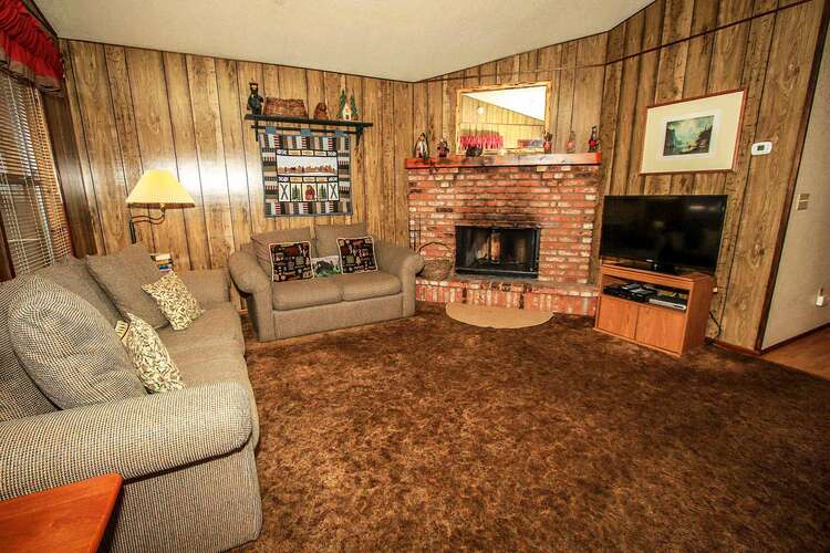 Living Room with Fireplace and Flatscreen TV
