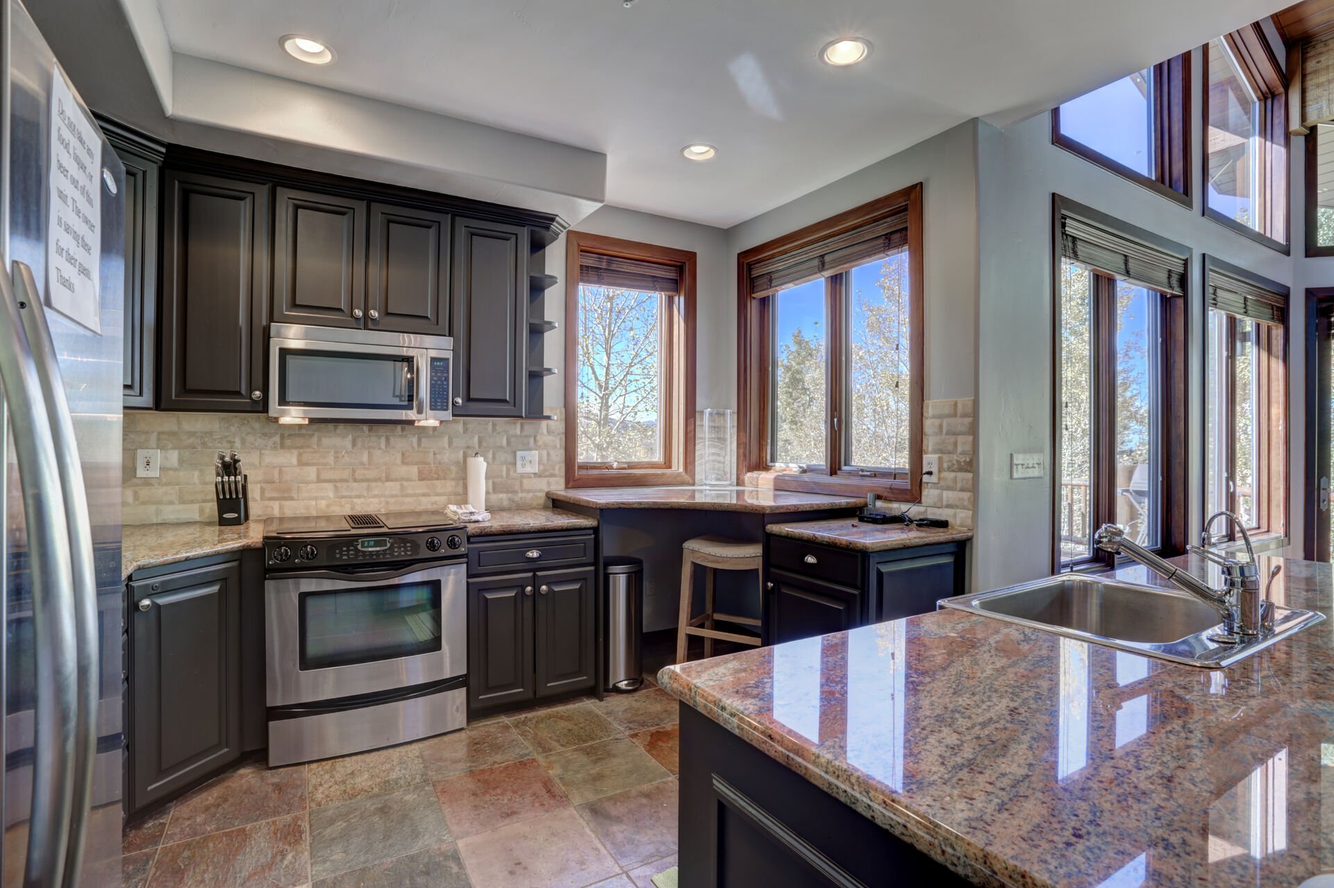 Fully Equipped Gourmet Kitchen with Granite Counters, Stainless Steel Appliances