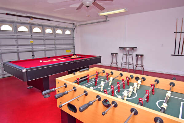 Garage converted to games room.  Has pool table, foosball table and dartboard.