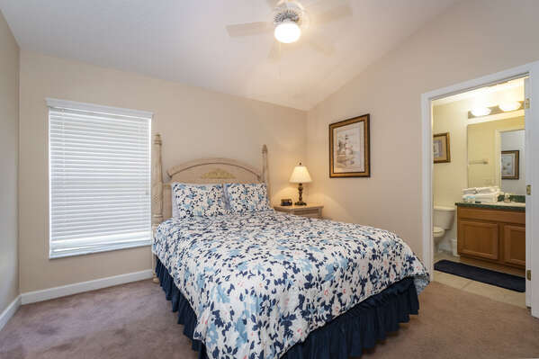Master Suite 2 showing Queen bed and bath access