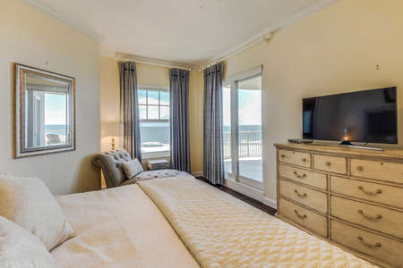 Master Bedroom with King Bed and Balcony Access