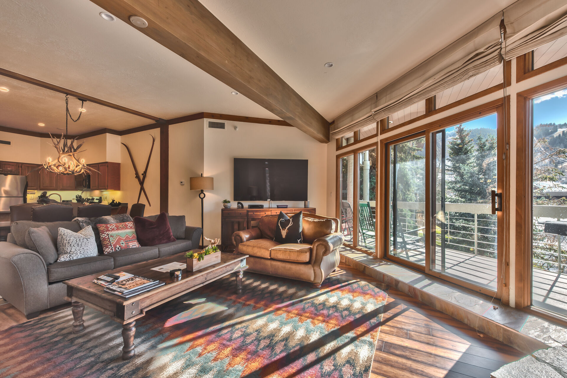 Living Room with Comfortable Mountain Furnishings, New Hardwood Floors and Mountain Views