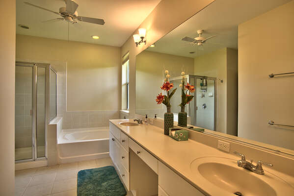 Primary Bathroom with Double Sinks, Soaking Tub and Tiles Show