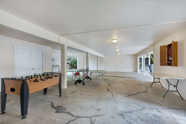 Parking Garage and Common Area in this Kona Hawai'i vacation rental with Foosball, Ping Pong, Darts.