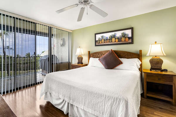 Master Bedroom with King Bed and Lanai Access at Kona Hawaii Vacation Rentals