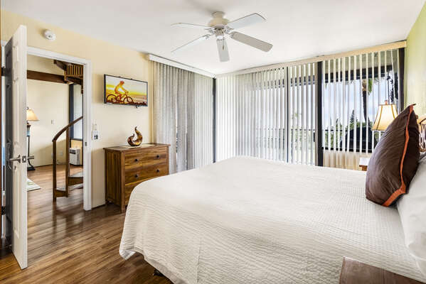Master Bedroom with Views of Outside and the Living Area