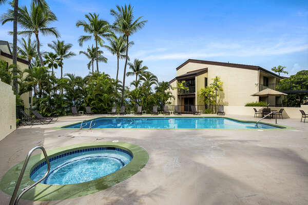 Pool and Hot Tub with Palm Trees Surrounding the Area