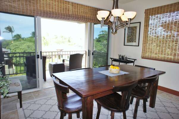 Dining Area with Lanai Access, Dining Table, and Chairs