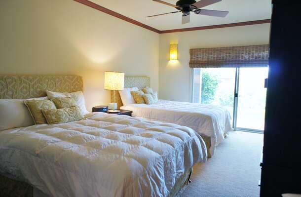 Bedroom with 2 Large Beds and Ceiling Fan