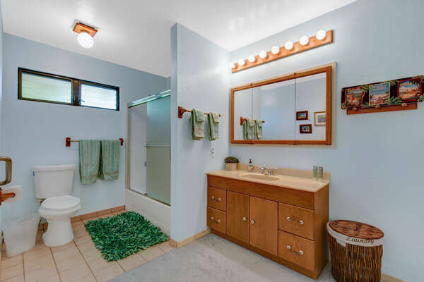 Bathroom 4 ensuite to Bedroom 4 with vanity sink, toilet, and glass door shower.