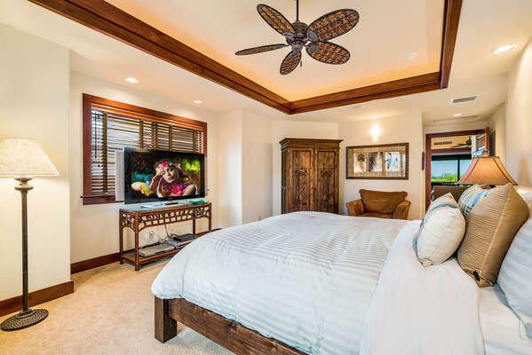 Large Bed, Smart TV, Ceiling Fan, Armoire, and Armchair
