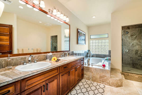 Bathroom with Dual Sinks, Soaking Tub, and Walk-in Shower