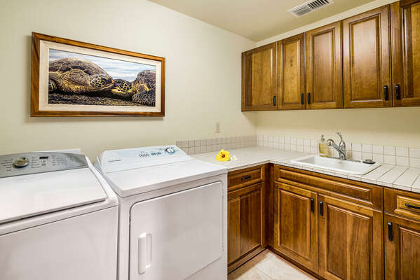 Laundry Room with Washer, Dryer, and Sink