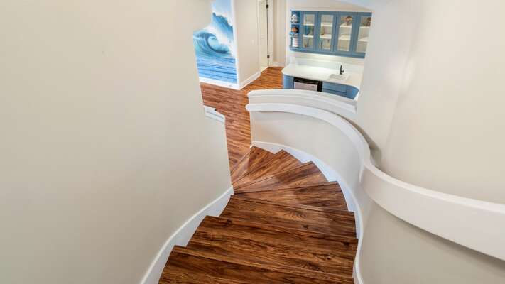 Stairs leading to downstairs area