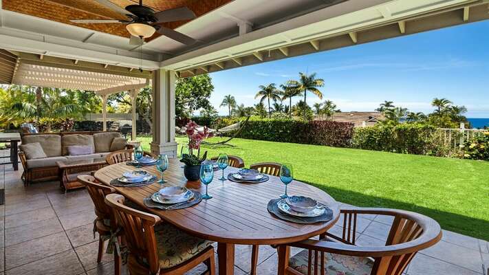 Outside Dining table on the back lanai with seating for 6.