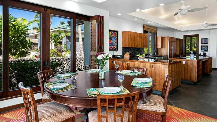 The main floor is an open design with high ceilings and flows through a well-equipped gourmet kitchen
