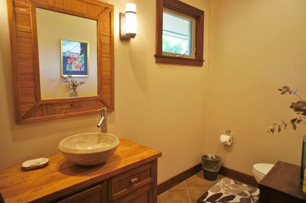 Half Bathroom with Vessel Sink and Toilet