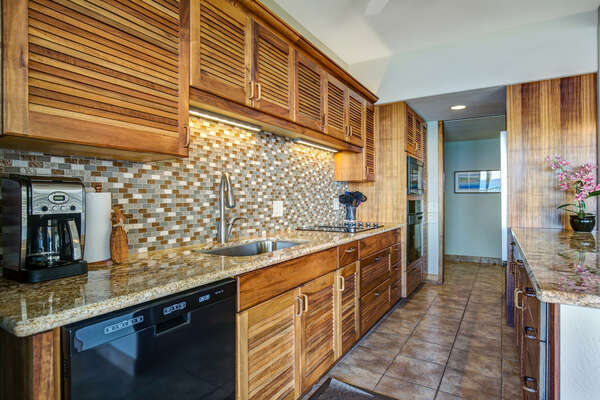 View into the kitchen and its modern amenities.