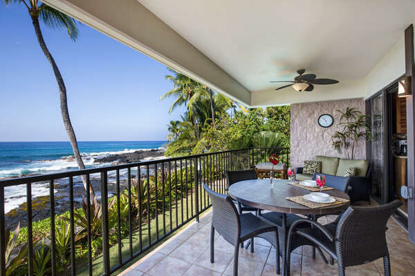 Spacious Lanai of this Kona Hawai'i vacation rental with tables and seating.