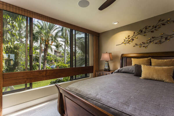 Guest Bedroom with King Bed and Tropical Views