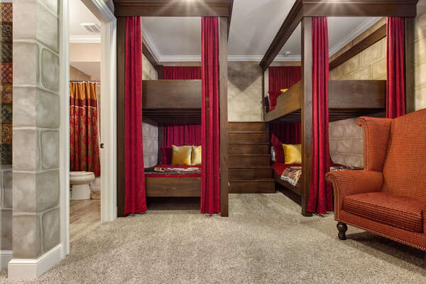 Send the kids to Hogwarts in this Harry Potter themed bedroom with custom bunk beds