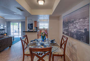 Trey ceilings, large windows and engaging decor create desirable retreat for couples or a family.
