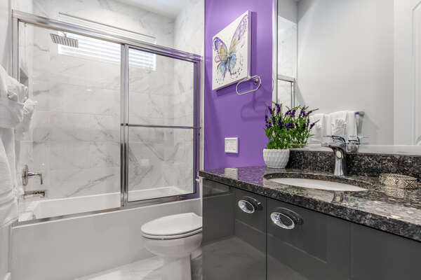 The ensuite bathroom offers more privacy and space
