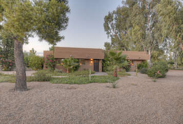 Exquisite, ranch style Scottsdale home on large lot awaits your arrival.