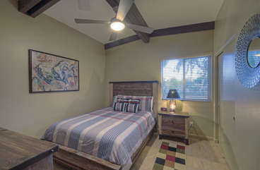 The third bedroom now features two extended length twin beds for peaceful slumber and a TV.