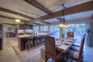 Picturesque formal dining room seats 8 and offers views of the backyard paradise.
