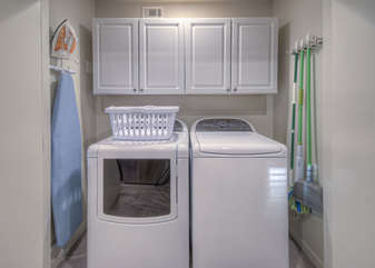 A fully stocked laundry room has new appliances to keep your wardrobe ready for the next Arizona adventure.