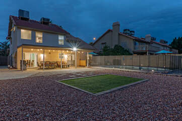 The private and enclosed backyard is the perfect setting for family fun and outside activities.