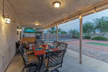 Delightful backyard features a pool with option to heat, covered patio and views of the Painted Mountain Golf Course.