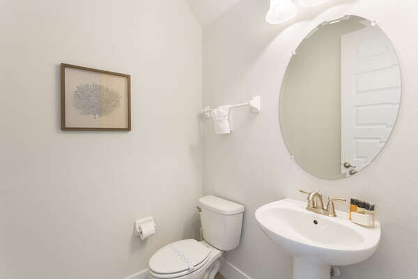 Downstairs you will find a half bath perfect for when friends come by to visit for the day