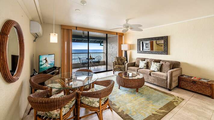 Living/Dining area with ocean views. Ductless AC units in living area and bedroom