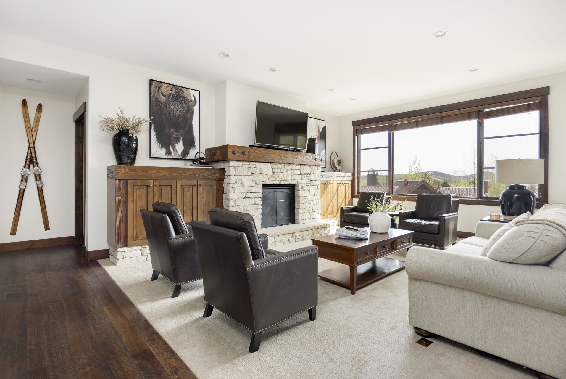 Comfortable Living Room with Contemporary Furnishings, a Gas Fireplace, Smart TV with DirecTv
