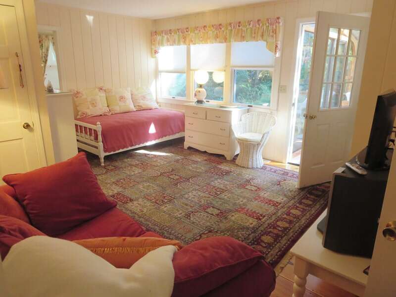 The TV room, offers access to the sunroom - 19 Old Cart Way -Chatham- Cape Cod -New England Vacation Rentals