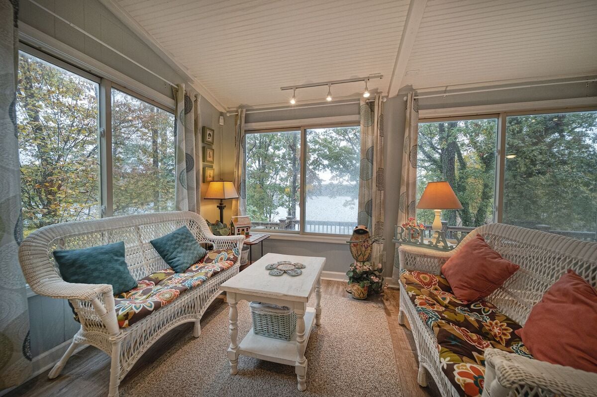 Large windows look out onto the lake from the great room.