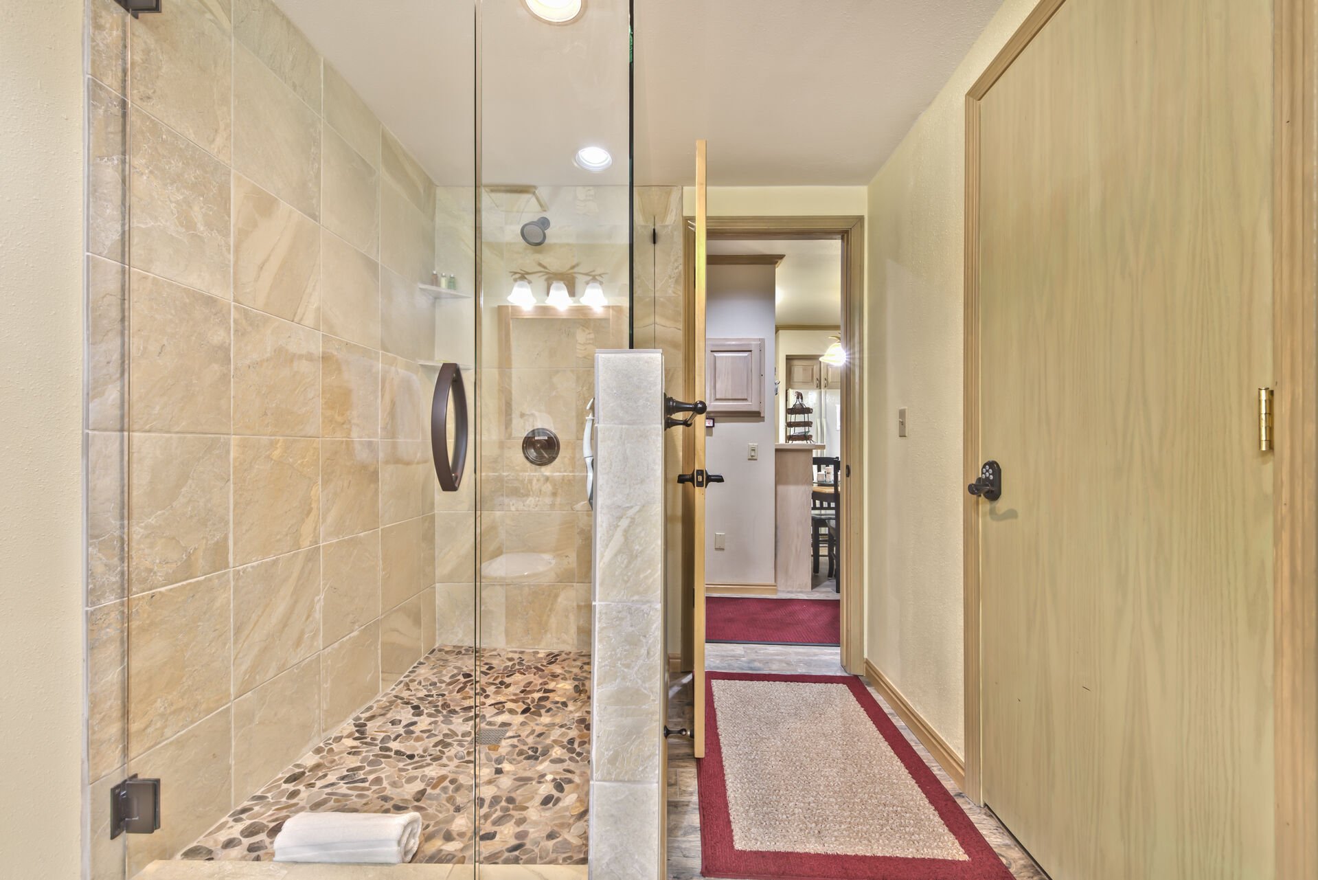 Master Bathroom with Stone/Tile Shower