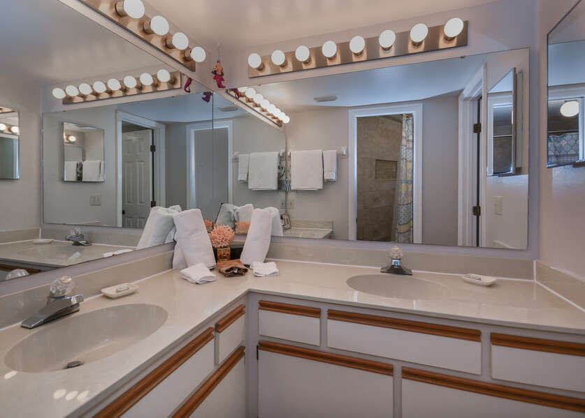 Master bath has double sinks and a walk in shower.