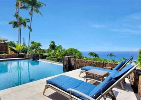 This Kona vacation home rental features a pool with ocean views.