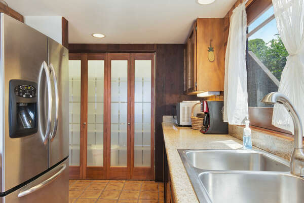 View of sink and kitchen in refrigerator.