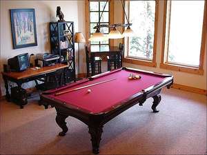 Pool Table, Computer, and a Gas Fireplace in the Game Room